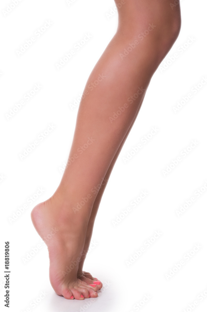 Beautiful ballerina legs isolated on the white background Beautiful ballerina legs isolated on the white background