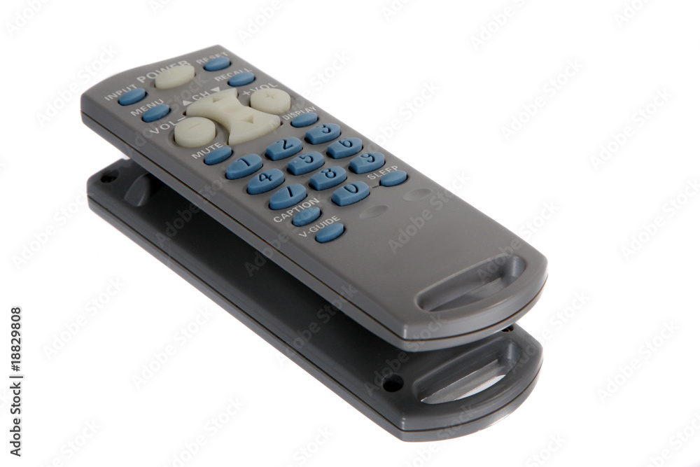 Generic television remote on a mirrored surface Generic television remote on a mirrored surface