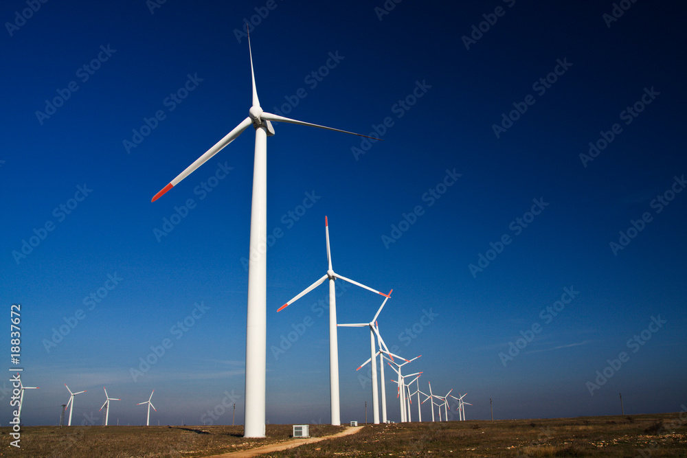 Wind power generators on blue sky Wind power generators on blue sky