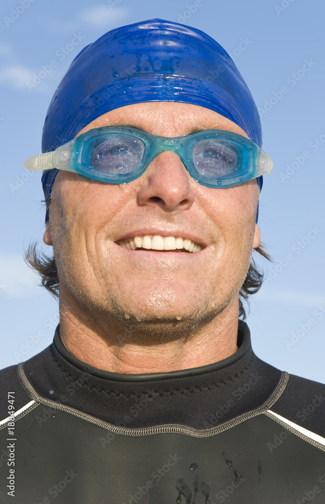happy smiling man in wetsuit