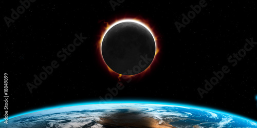 Fototapeta Naklejka Na Ścianę i Meble -  éclipse de soleil vue depuis l'espace avec l'ombre de la lune projeté sur la Terre