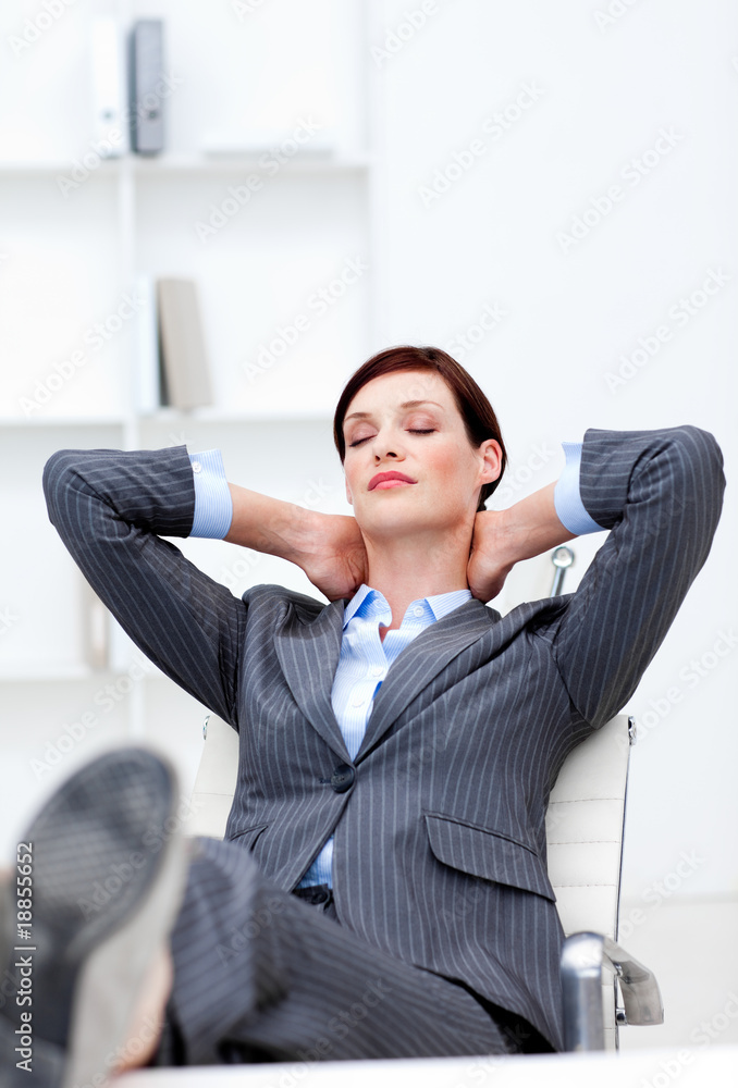 Young Businesswoman sleeping with feet on desk Young Businesswoman sleeping with feet on desk