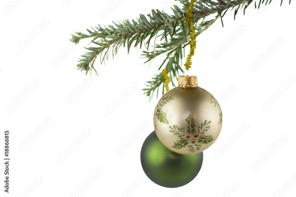 two christmas baubles on fir tree two christmas baubles on fir tree