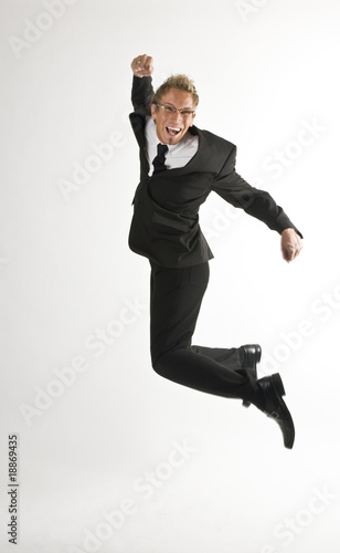 Business man jumping and is Happy