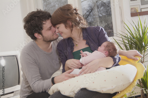 Junge Familie mit Baby, Säugling