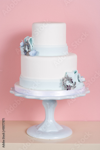 Two-tiered Cake Against Pink Background
