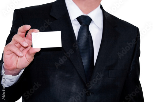 businessman looking out from behind a white blank