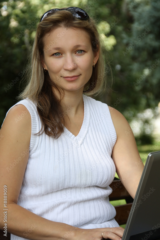 Younger girl works at computer Younger girl works at computer