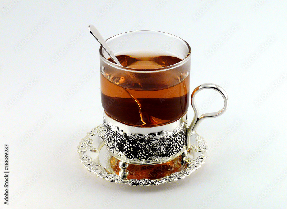Tea in glass mug and lemons Tea in glass mug and lemons
