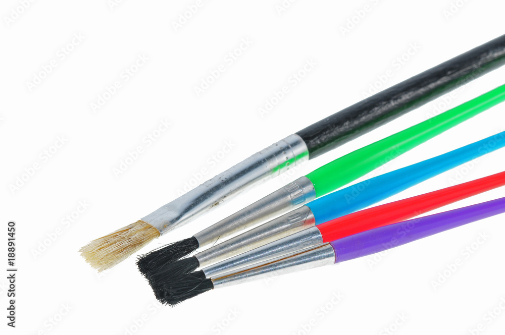 Fototapeta premium colorful paint brush on the table