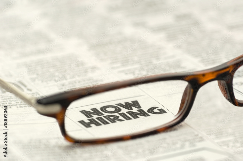 Now Hiring classified ad framed in glasses Now Hiring classified ad framed in glasses