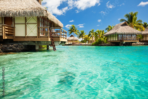 Over water bungalows with steps into amazing lagoon #18893423