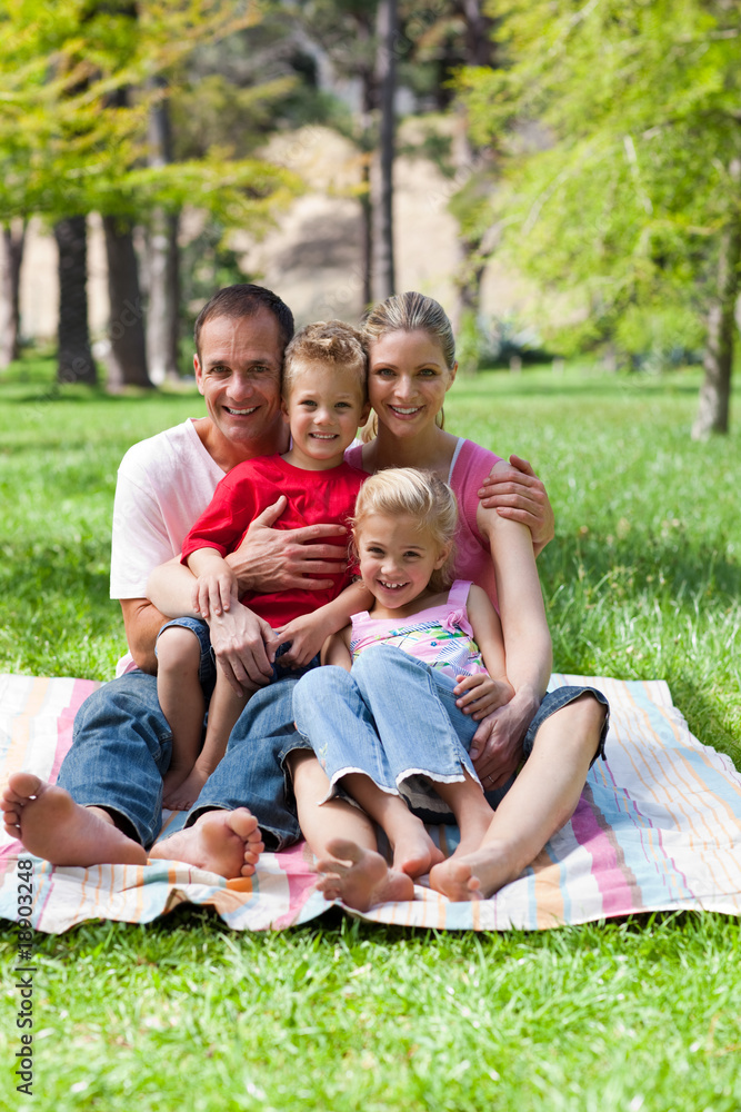 Portrait of a smiling family having a picnic