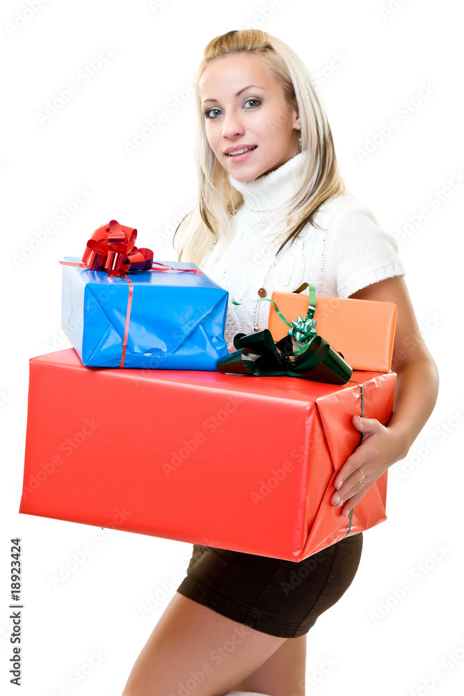 cute woman holding presents at christmas time cute woman holding presents at christmas time