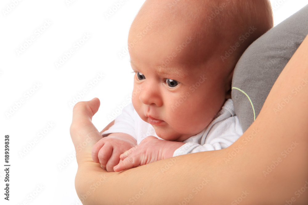 Little boy on mothers hands. Isolated on white background Little boy on mothers hands. Isolated on white background