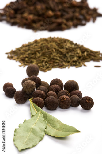 bay leaves, cloves, caraway and black pepper photo