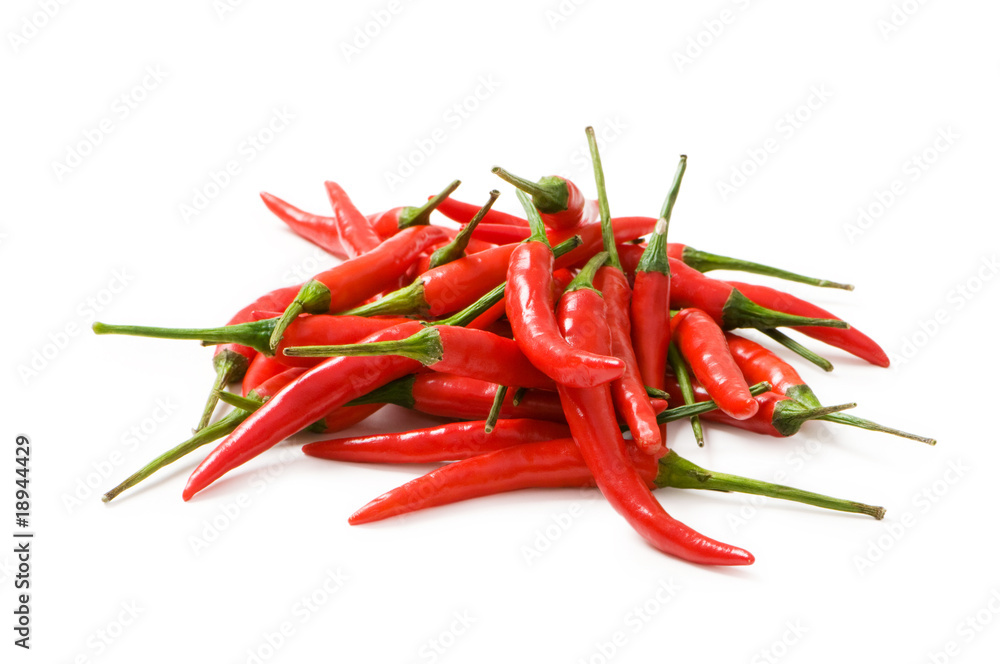Red chili peppers isolated on the white Red chili peppers isolated on the white