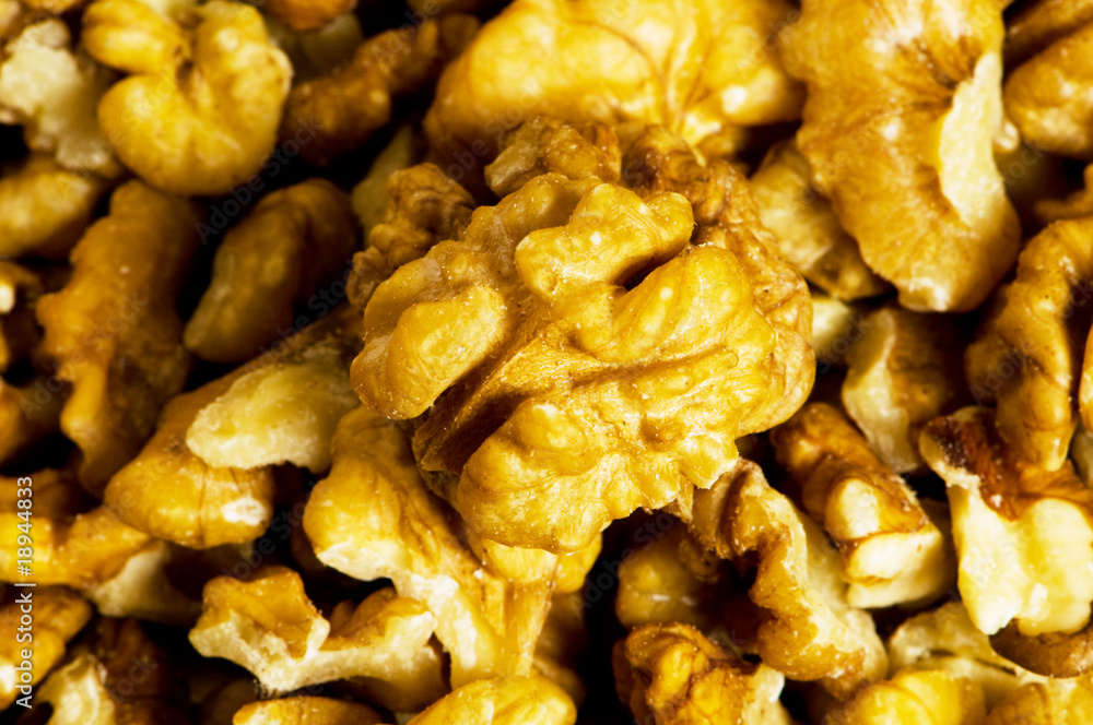 Background made of fresh walnut nuts Background made of fresh walnut nuts