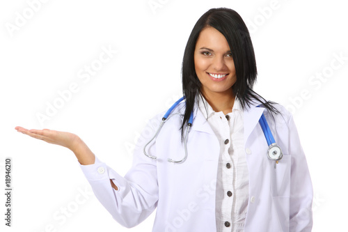 Young female doctor gesturing on white background