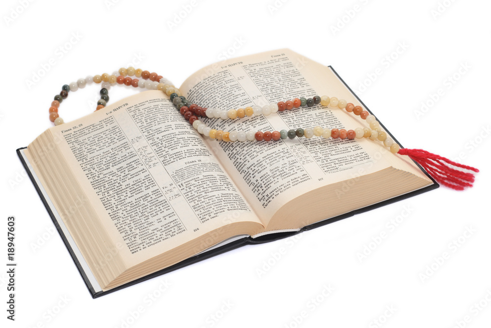 Fototapeta premium nephritic rosary over an holy bible.