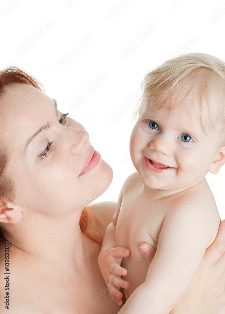 smiling baby girl and a red-haired mother after bathing smiling baby girl and a red-haired mother after bathing