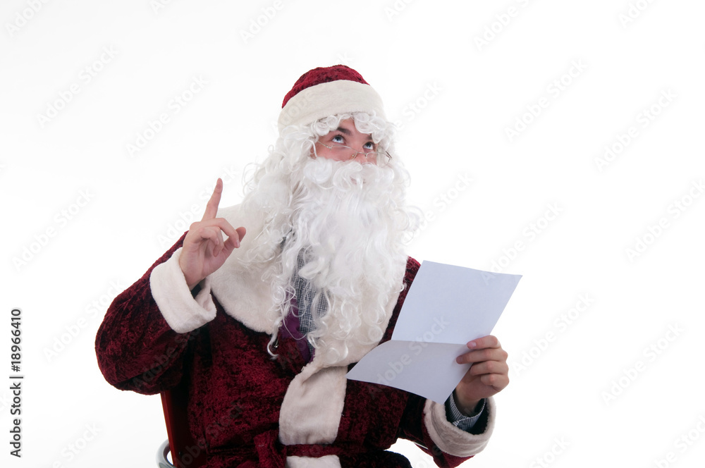 Naklejka premium santa reads the letter