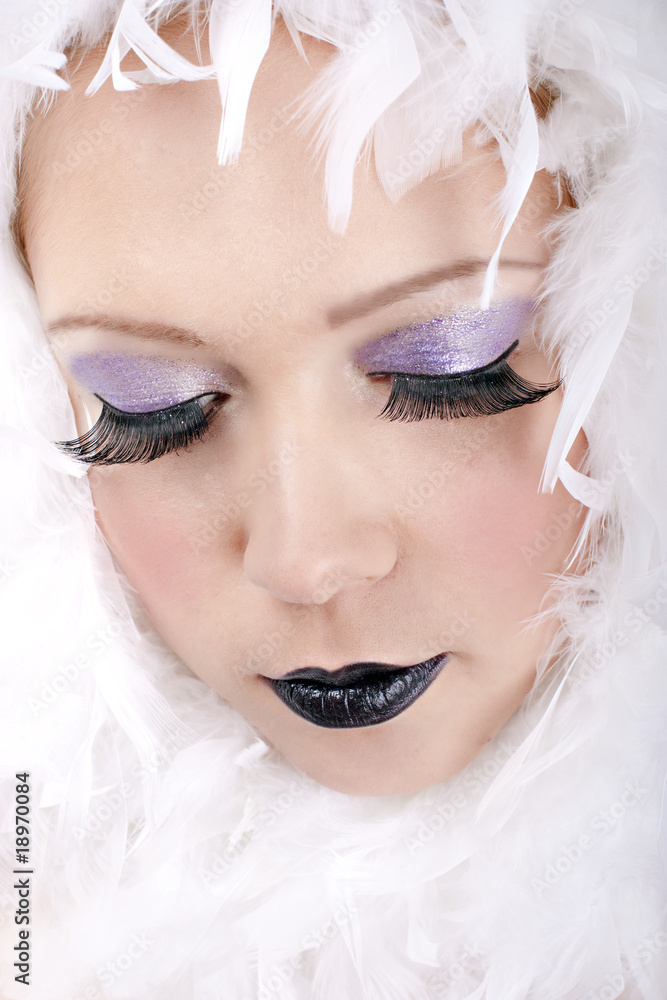 Portrait of young woman with creative makeup