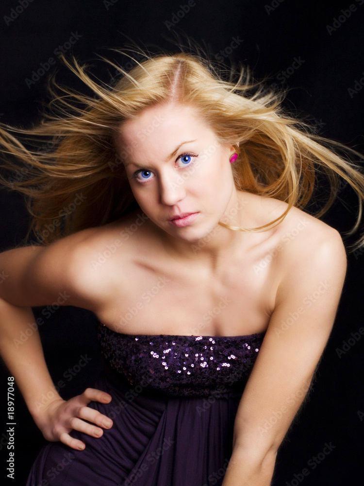 Naklejka premium Portrait of a beautiful blond dancing girl