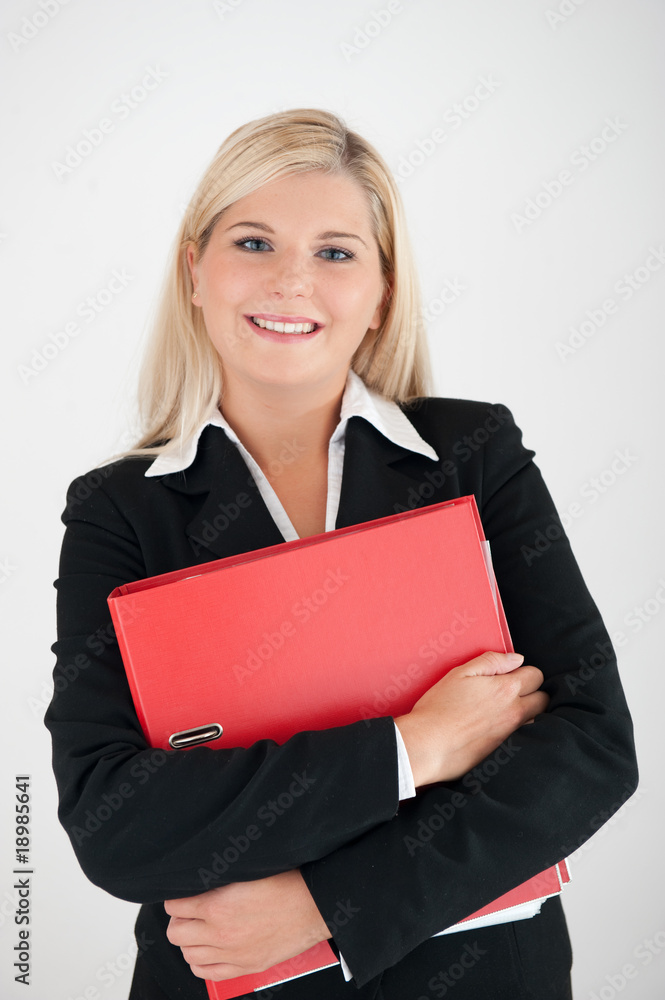 Young business woman in a black suit with folder Young business woman in a black suit with folder