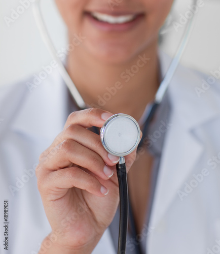 Close-up of a doctor holding a stethoscope