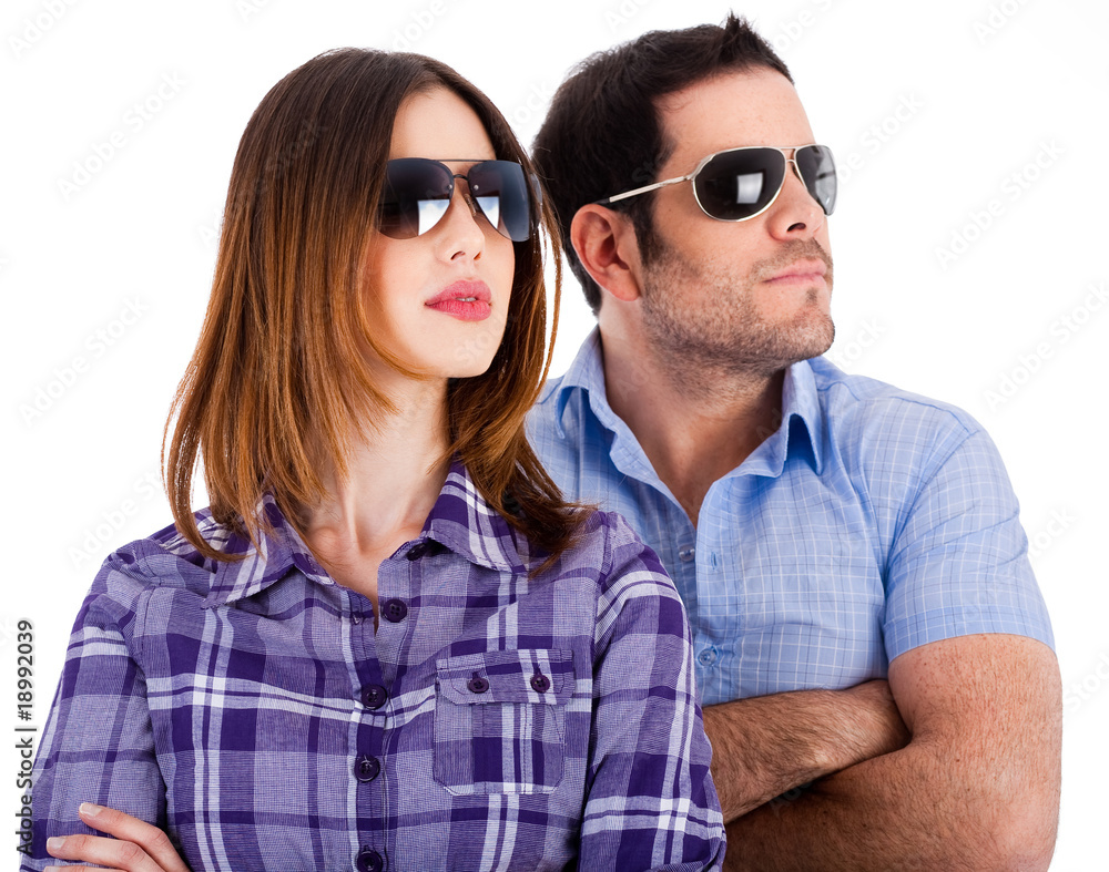 Fsshion models looking left with sunglasses Fsshion models looking left with sunglasses