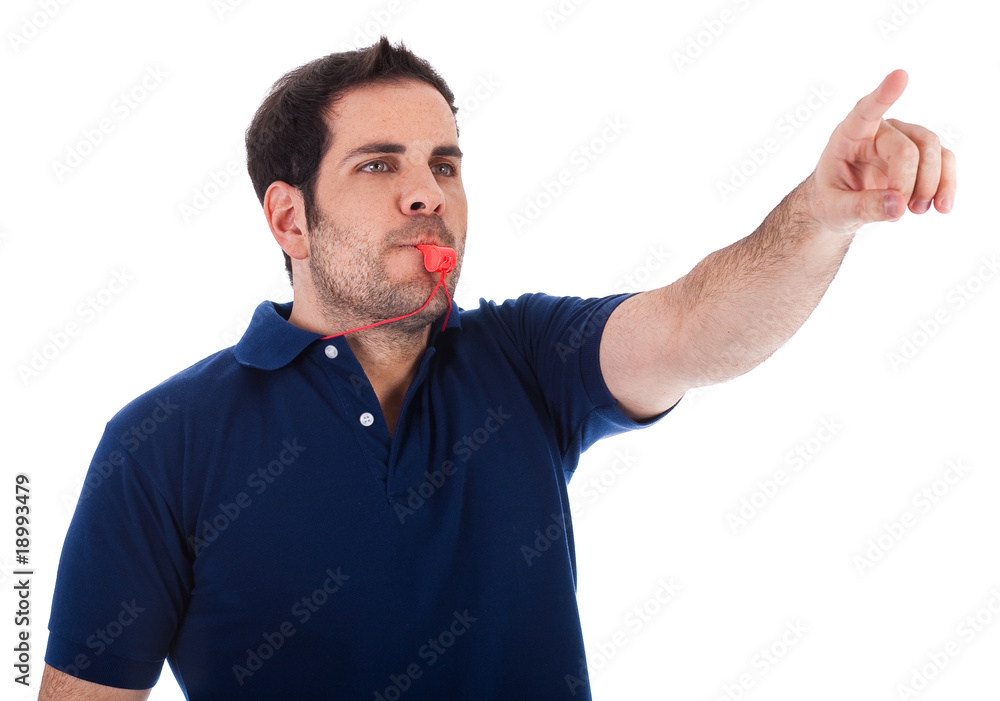 Sports coacher whistling and pointing up Sports coacher whistling and pointing up