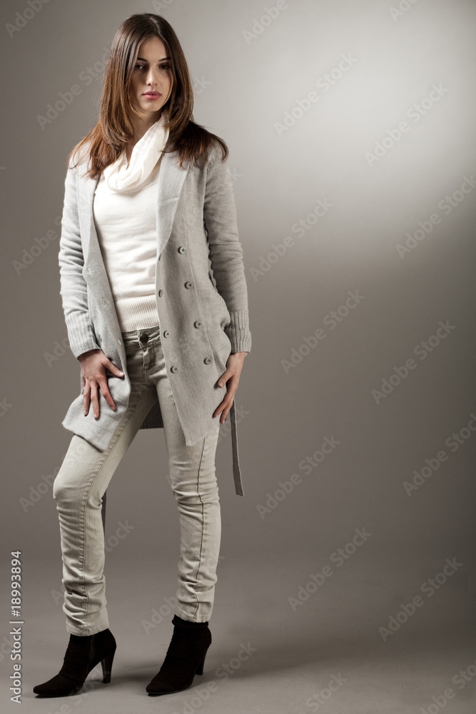 Obraz premium young brunette model with her spring coat