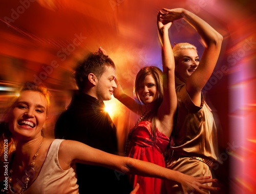 People dancing in the night club .