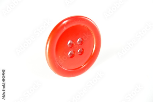 Red button on white