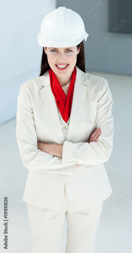 Attractive female architect with folded arms Attractive female architect with folded arms