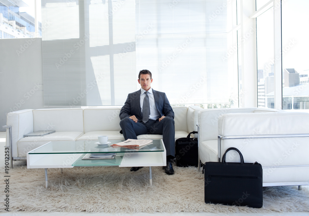 Portrait of a businessman in a waiting room Portrait of a businessman in a waiting room