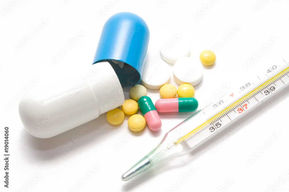 Thermometer and tablets Thermometer and tablets