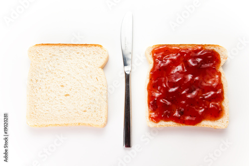 slice of bread and strawberry marmalade