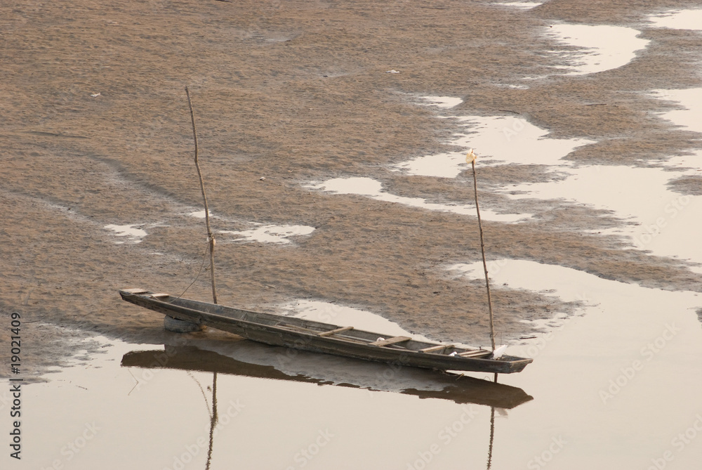 Two boats on the riverbed of Mekong