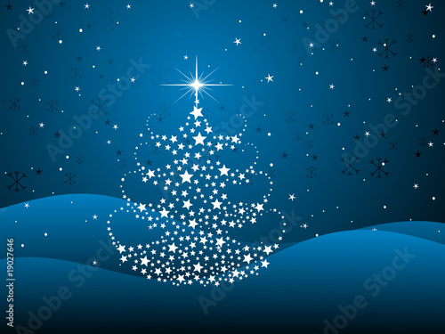 blue background with shiny xmas tree