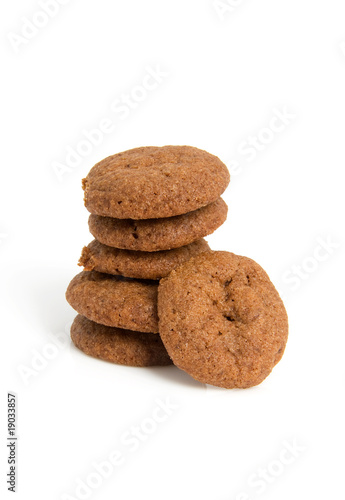 Home baked pepernoten cookies over white background