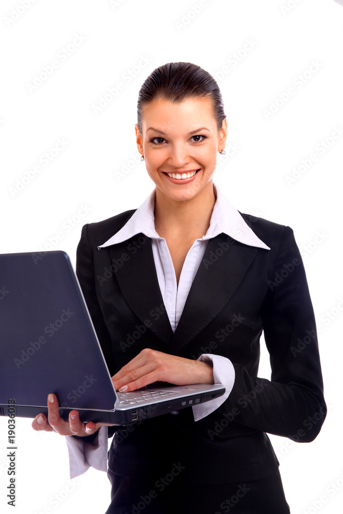 pretty business woman looking at laptop. pretty business woman looking at laptop.
