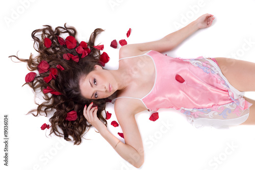 Bild auf Leinwand Beautiful young woman in pink nightgown