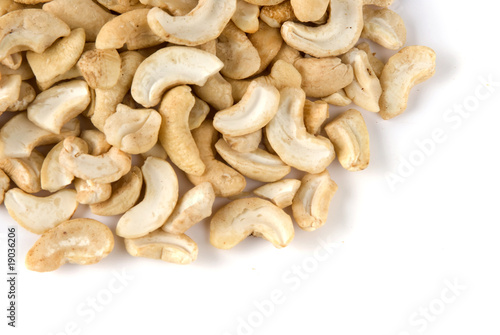Pile of cashew nuts in isolated white background