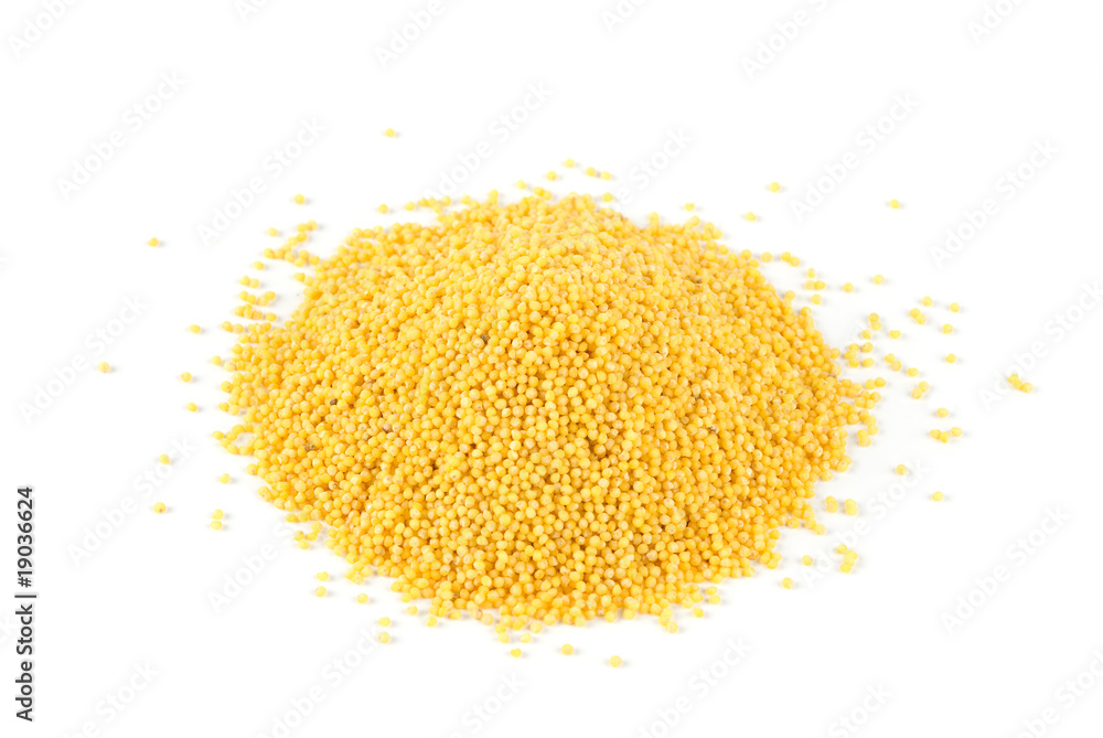Heap of millet isolated on white Heap of millet isolated on white