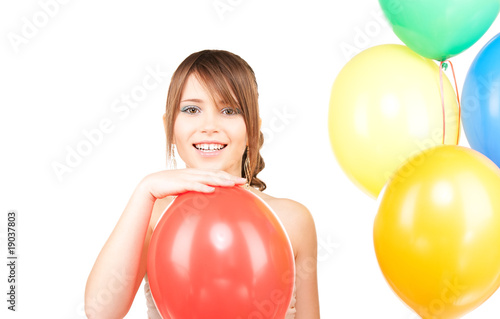 happy teenage girl with balloons