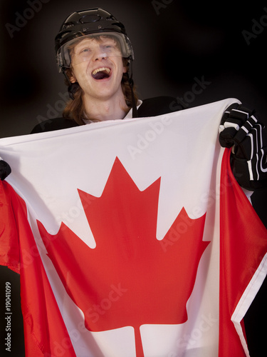 Photography ice hockey player with canadian flag