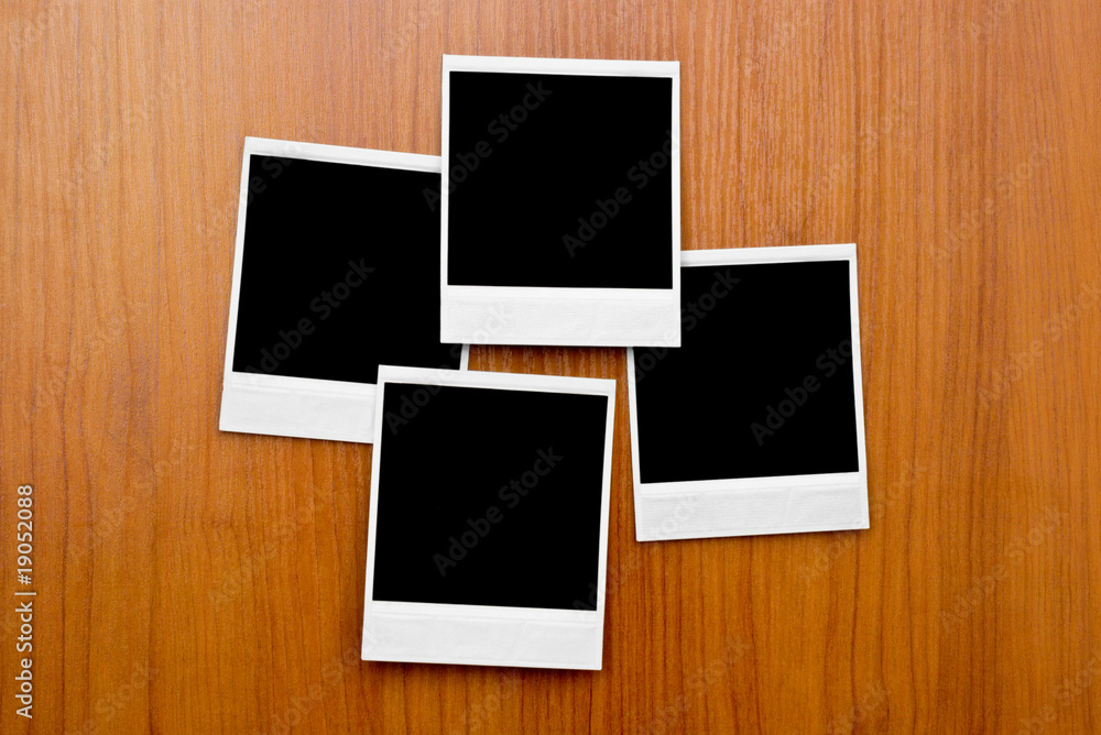 Blank photo frames on board Blank photo frames on board