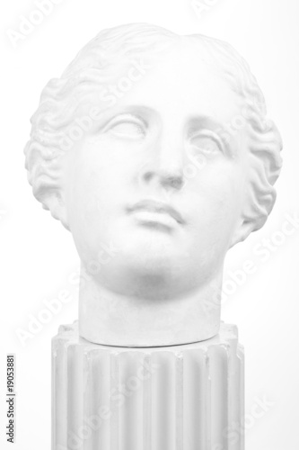 Ancient Greek bust on column over white background